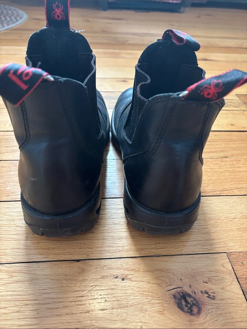 Black Slip-On Redback Boots with Red Pull Tabs